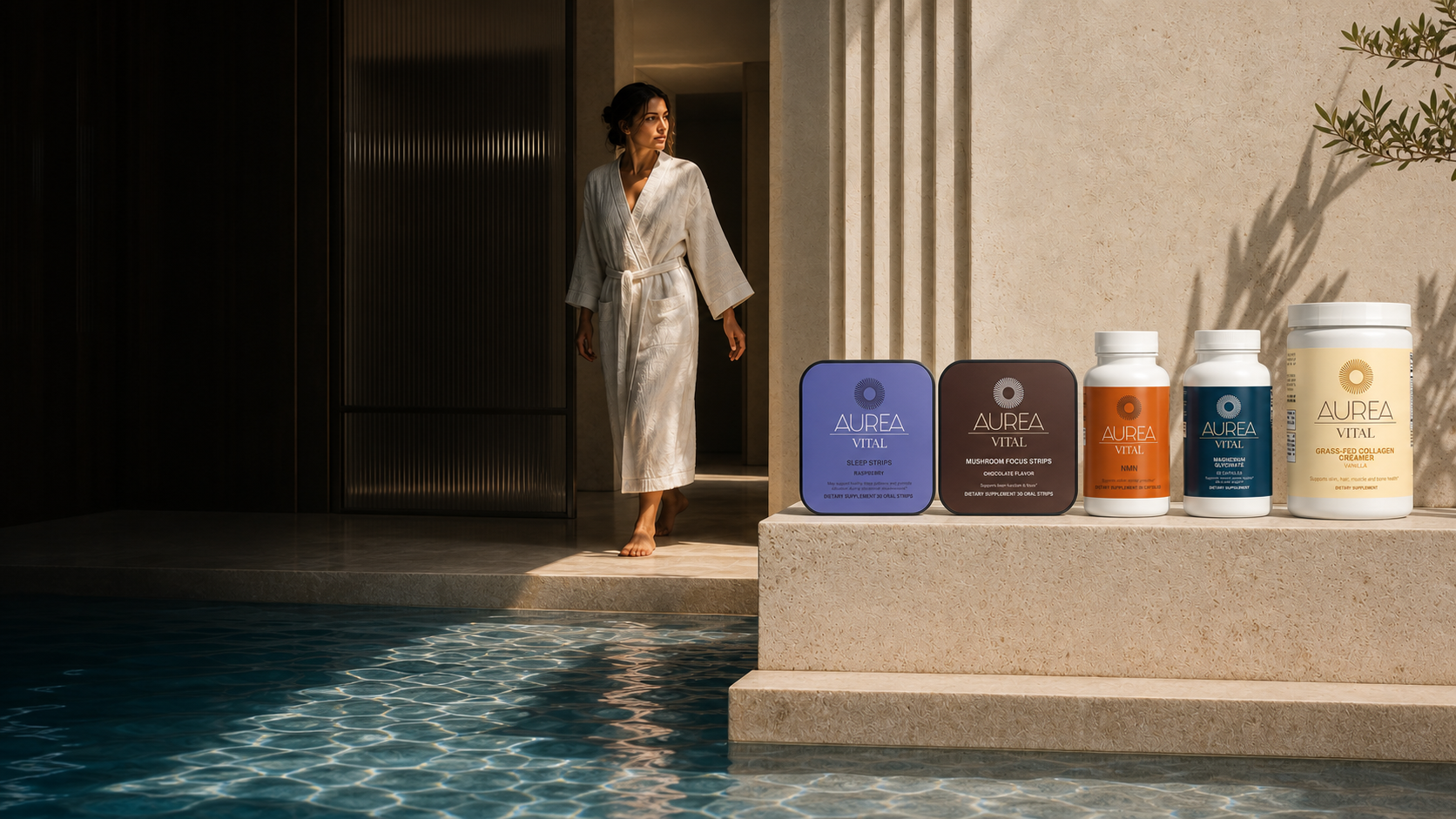 Aurea Vital essentials beside a poolside bathhouse in golden light